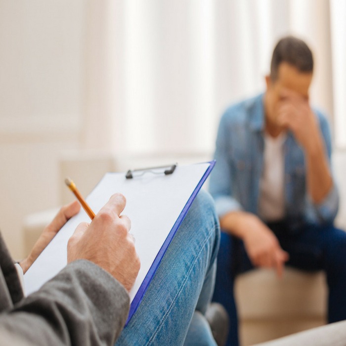 individual male receiving counseling support